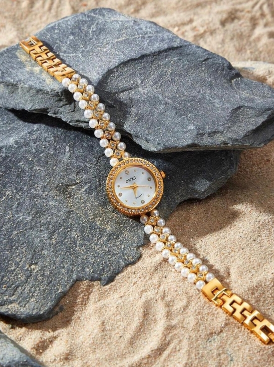 Anthropologie Accessories - Gold and Pearl Bracelet Watch